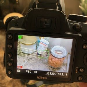 Nikon D3200, charger and case. Great digital camera for a present.